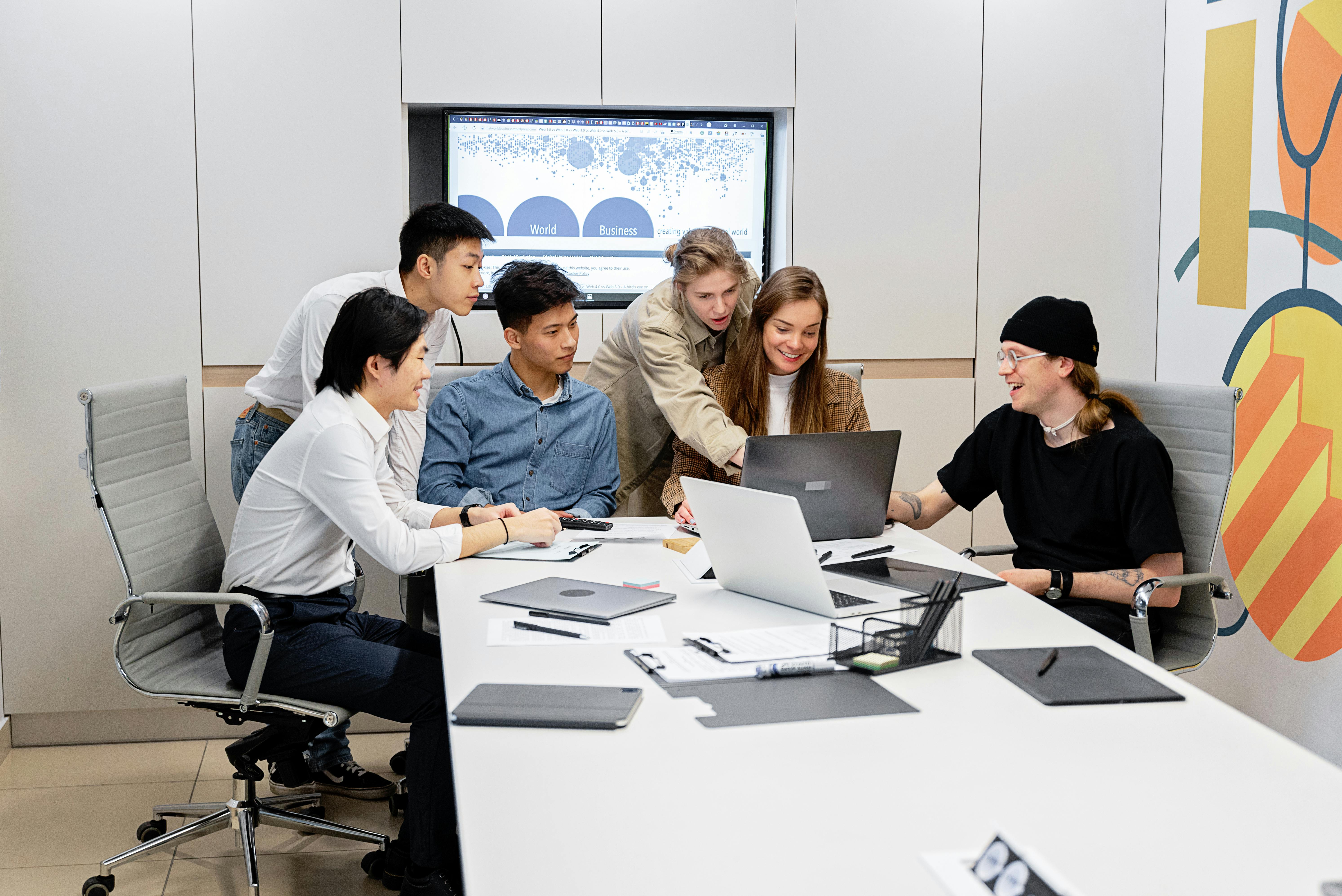 Energetic marketing stand-up in a modern office.